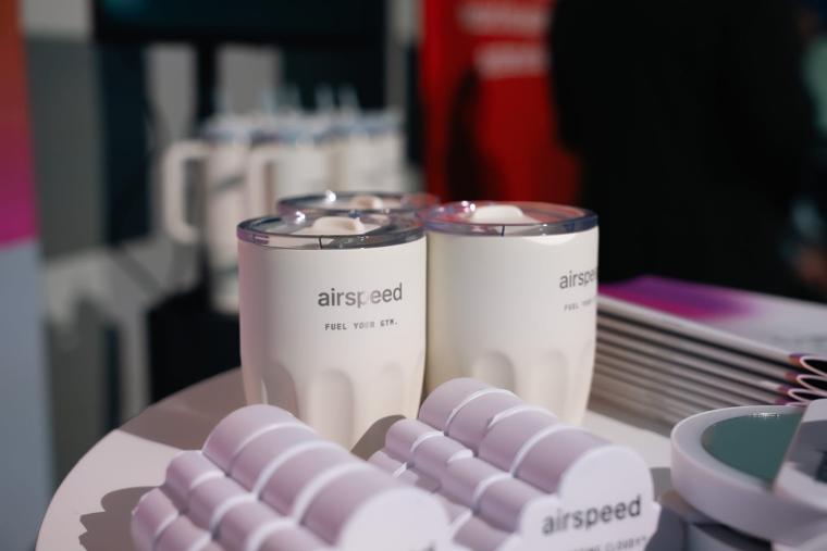 Booth favorites Airspeed tumblers and candles on the booth table